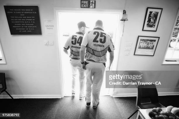 Dan Christian and Scott Boland of the Australian Indigenous Men's cricket walk out to play against the MCC at Arundel cricket ground on June 5, 2018...