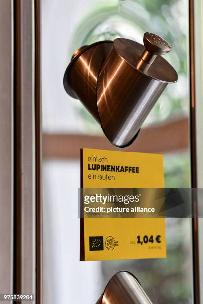May 2018, Germany, Berlin: Lupines coffee is offered from a dispenser at the zero waste shop 'Der Sache wegen - einfach richtig einkaufen' at...