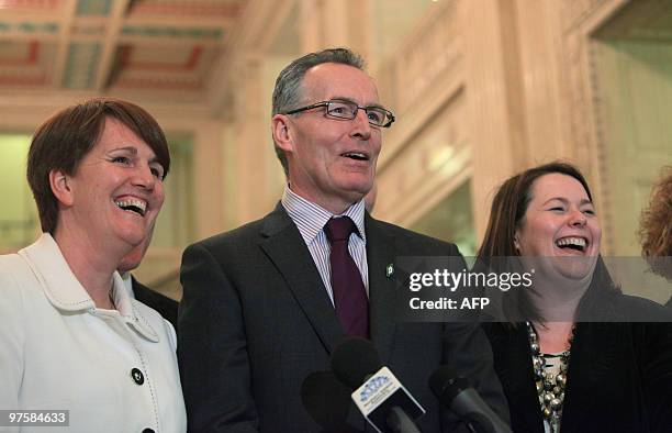 Sinn Fein deputy leader Gerry Kelly speaks to the media flanked by Caitríona Ruane, Education Minister and Michelle Gildernew, Minister for...