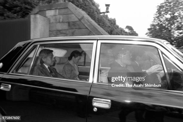 Crown Prince Akihito and Crown Princess Michiko are seen on departure at the Akasaka Palace to see Emperor Hirohito after vomiting blood on September...
