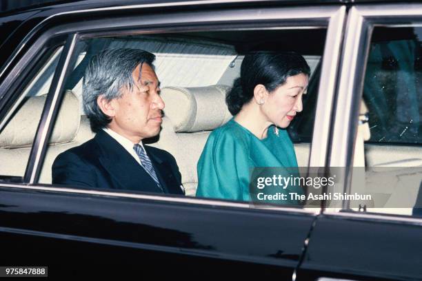 Crown Prince Akihito and Crown Princess Michiko are seen on arrival at the Akasaka Palace after seeing Emperor Hirohito after vomiting blood on...