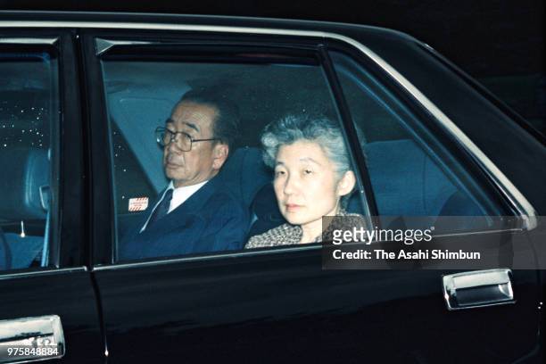 Atsuko Ikeda, daughter of Emperor Hirohito, and her husband Takamasa are seen on arrival at Haneda Airport to see Emperor Hirohito after vomiting...