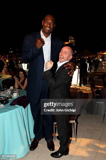 Dikembe Mutombo and Barry McGuigan attend the Laureus Welcome Party part of the Laureus Sports Awards 2010 at the Fairmount Hotel on March 9, 2010 in...