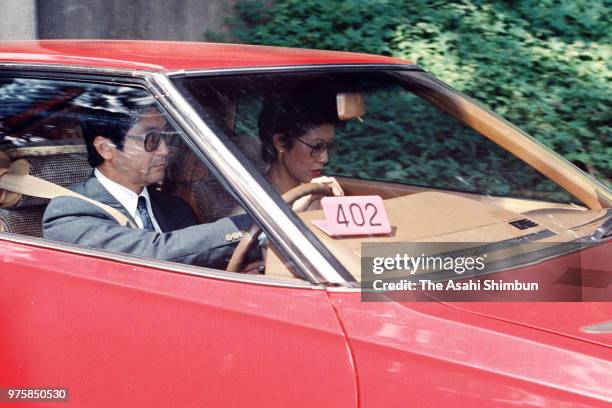 Takako Shimazu , daughter of Emperor Hirohito, and her husband Hisanaga are seen on departure at the Imperial Palace after seing the Emperor after...