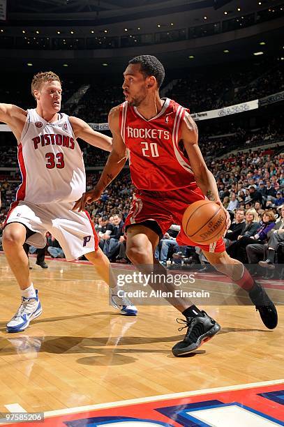 Jared Jeffries of the Houston Rockets drives against Jonas Jerebko of the Detroit Pistons during the game on March 7, 2010 at The Palace of Auburn...