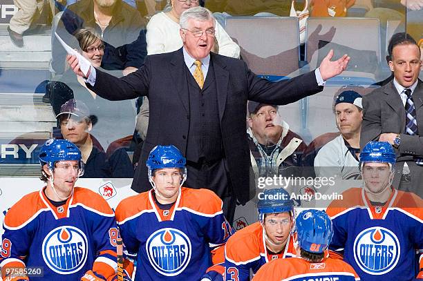Pat Quinn waits for an explanation from a referee as his Edmonton Oilers play the New Jersey Devils at Rexall Place on March 7, 2010 in Edmonton,...
