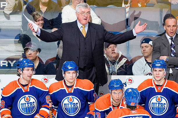 pat-quinn-waits-for-an-explanation-from-a-referee-as-his-edmonton-oilers-play-the-new-jersey.jpg
