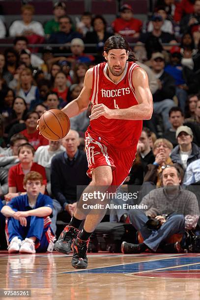 Luis Scola of the Houston Rockets drives against the Detroit Pistons during the game on March 7, 2010 at The Palace of Auburn Hills in Auburn Hills,...