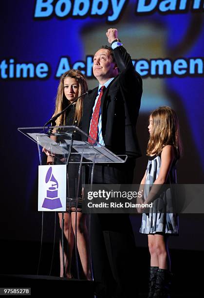 Alexa Darin, Dodd Darin and Olivia Darin accept the Lifetime Achievement Award on behalf of the late Bobby Darin at the Special Merit Awards and...