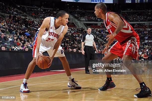 Tayshaun Prince of the Detroit Pistons handles the ball against Shane Battier of the Houston Rockets during the game on March 7, 2010 at The Palace...