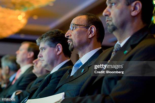 Khalid al-Falih, chief executive officer of Saudi Arabian Oil Co., also known as Saudi Aramco, second from left, waits to speak at the 2010 CERAWEEK...