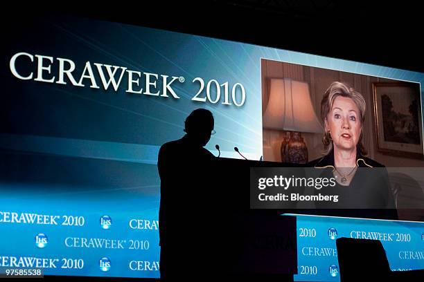 Hillary Clinton, U.S. Secretary of state, welcomes attendes via a video address as Daniel Yergin, chairman of IHS Cambridge Energy Research...