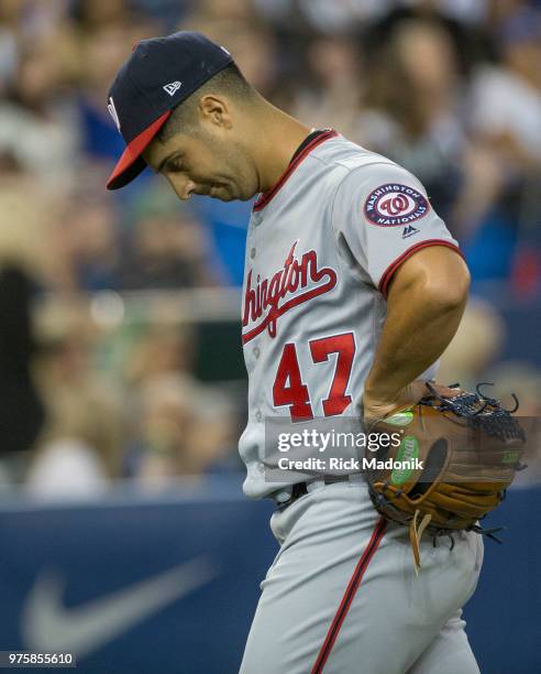 Washington Nationals starting pitcher Gio Gonzalez heads for the dugout after being pulled from the game. Toronto Blue Jays Vs Washington Nationals...