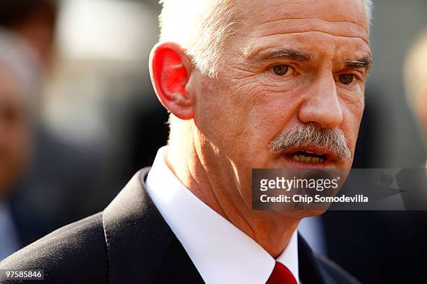 Greek Prime Minister George Papandreou takes questions from members of the news media after a meeting at the White House March 9, 2010 in Washington,...