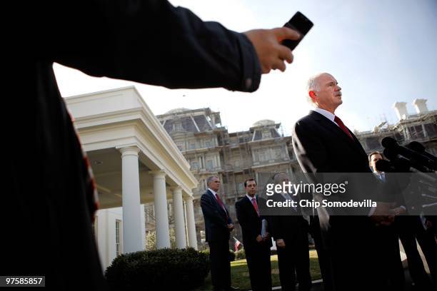 Greek Prime Minister George Papandreou takes questions from members of the news media after a meeting at the White House March 9, 2010 in Washington,...