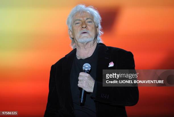French singer Hugues Aufray performs on stage during the 25th Victoires de la Musique yearly French music awards ceremony on March 6, 2010 at the...