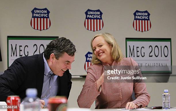 California republican gubernatorial candidate and former eBay CEO Meg Whitman jokes with Union Pacific VP of Public Affairs Scott Moore during a...