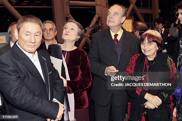 Japanese film director and artist Takeshi Kitano , French culture minister Frederic Mitterrand and French director Agnes Varda visit Kitano's...