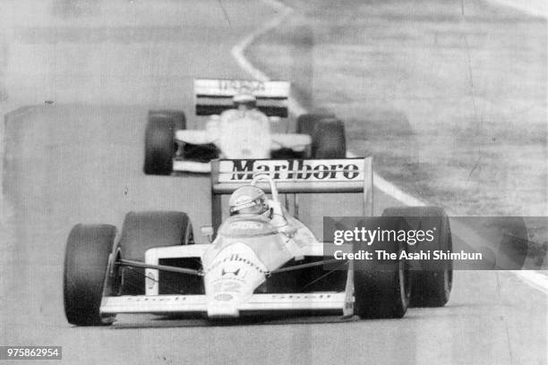 Ayrton Senna of Brazil and McLaren-Honda competes in the qualifying of the Formula One Japanese Grand Prix at Suzuka Circuit on October 28, 1988 in...