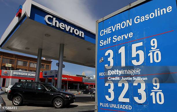 Gas prices are displayed at a Chevron gas station March 9, 2010 in San Francisco, California. Chevron Corp. Announced that it would cut 2,000 jobs...
