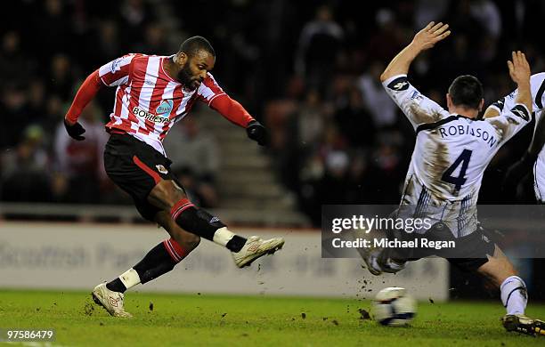 Darren Bent of Sunderland scores to make it 2-0 during the Barclays Premier League match between Sunderland and Bolton Wanderers at the Stadium of...