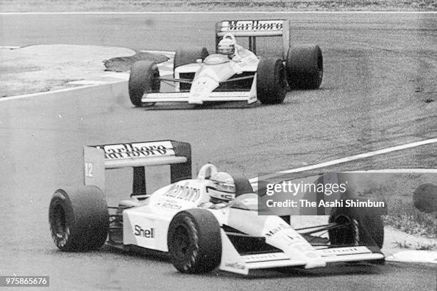 Ayrton Senna of Brazil and McLaren-Honda leads to Alain Prost of France and McLaren-Honda during the race of the Formula One Japanese Grand Prix at...