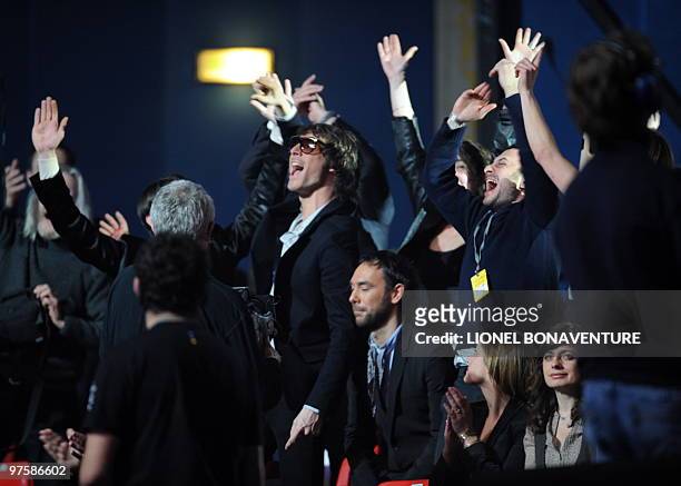 French members of pop rock music band "Pony Pony Run Run" Gaetan and Amael react after receiving the award for popular revelation of the year during...