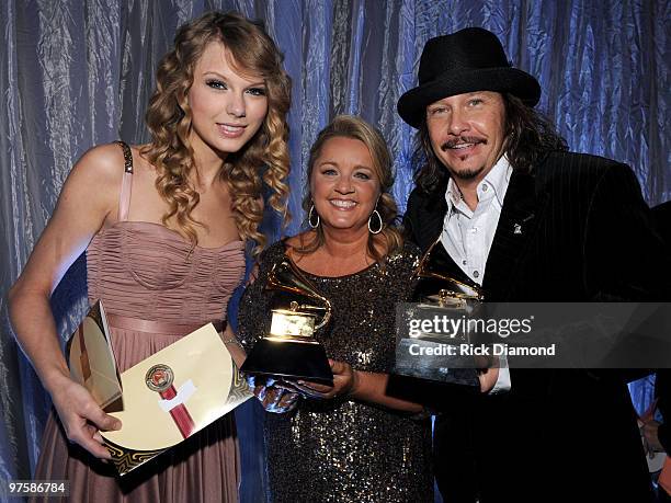 Musician Taylor Swift, co-songwriter Liz Rose and Recording Academy Chair of the Board of Trustees George Flanigen attend the 52nd Annual GRAMMY...