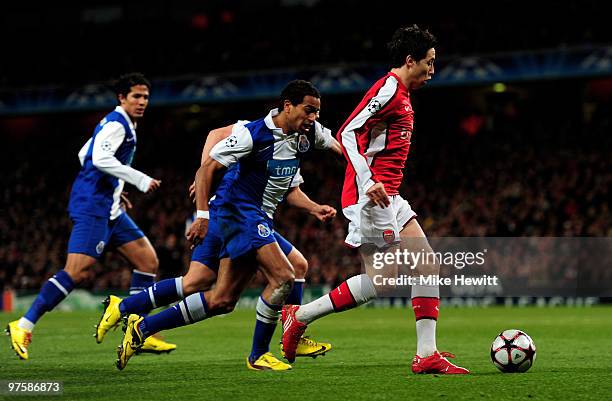 Samir Nasri of Arsenal cuts throught the Porto defence to score his team's third goal during the UEFA Champions League round of 16 match between...