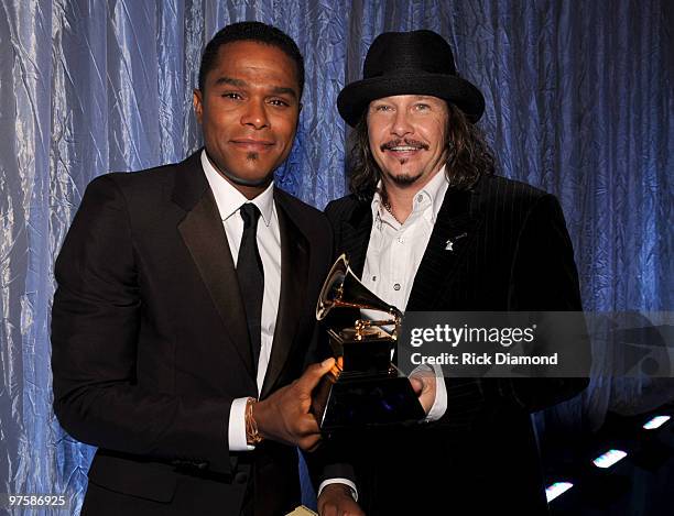 Singer Maxwell and Recording Academy Chair of the Board of Trustees George Flanigen attend the 52nd Annual GRAMMY Awards pre-telecast held at Staples...