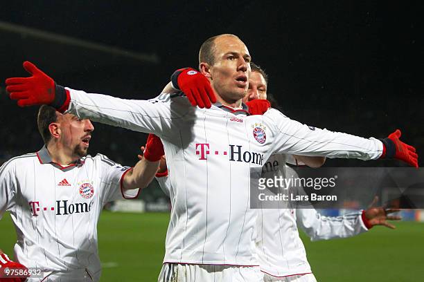 Arjen Robben of Muenchen celebrates after scoring his team's second goal during the UEFA Champions League round of sixteen, second leg match between...