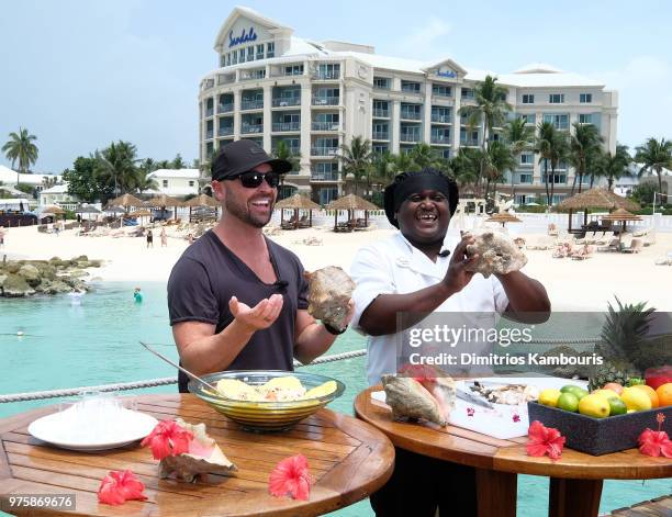 Cody Alan and Sandals Resort Chef Jamal prepare Bahamian conch salad at Sandals Royal Bahamian Spa Resort & Offshore Island on June 15, 2018 in...