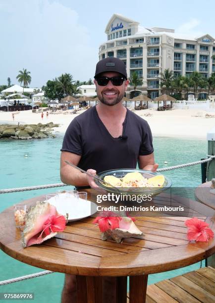 Cody Alan prepares Bahamian conch salad at Sandals Royal Bahamian Spa Resort & Offshore Island on June 15, 2018 in Nassau, Bahamas.