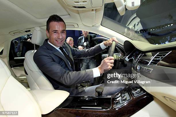 Kai Pflaume poses inside an Audi A8 during the presentation of the new Audi A8 on March 9, 2010 in Munich, Germany.