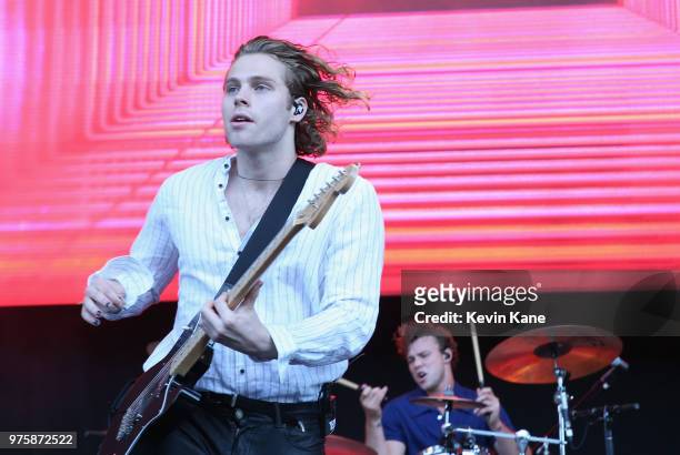 Ashton Irwin and Luke Hemmings of 5 Seconds of Summer performs onstage during 2018 BLI Summer Jam at Northwell Health at Jones Beach Theater on June...