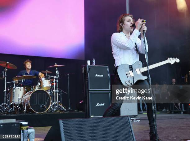 Ashton Irwin and Luke Hemmings of 5 Seconds of Summer performs onstage during 2018 BLI Summer Jam at Northwell Health at Jones Beach Theater on June...