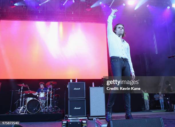 Ashton Irwin and Luke Hemmings of 5 Seconds of Summer performs onstage during 2018 BLI Summer Jam at Northwell Health at Jones Beach Theater on June...