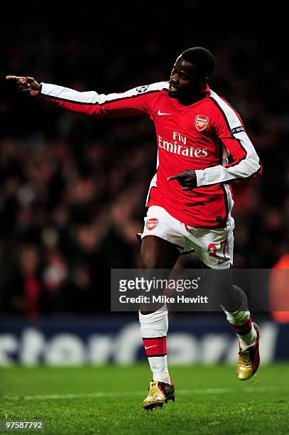 Emmanuel Eboue of Arsenal celebrates after scoring his teams fourth goal during the UEFA Champions League round of 16 match between Arsenal and FC...