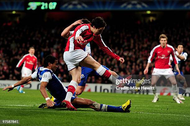 Samir Nasri of Arsenal scores his team's third goal during the UEFA Champions League round of 16 match between Arsenal and FC Porto at the Emirates...