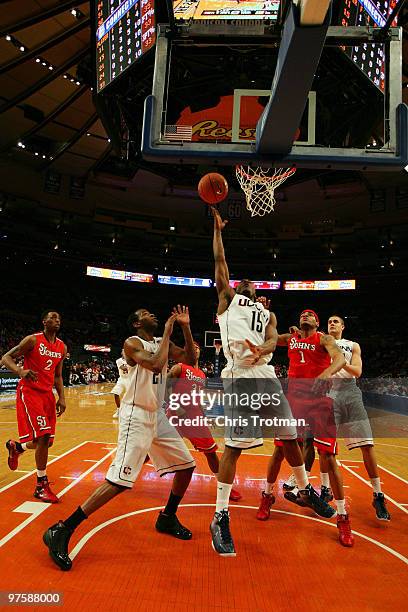 Kemba Walker the Connecticut Huskies drives to the basket against the St. John's Red Storm at Madison Square Garden on March 9, 2010 in New York, New...