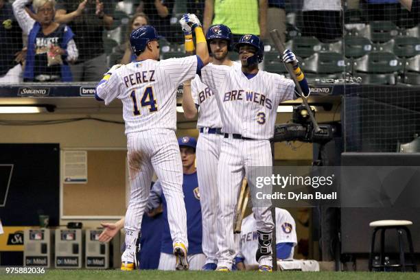Hernan Perez and Orlando Arcia of the Milwaukee Brewers celebrate after Perez hit a home run in the fifth inning against the Philadelphia Phillies at...