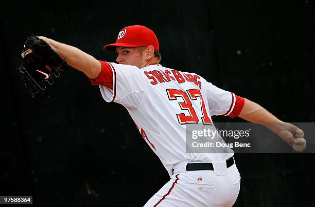 Starting pitcher Stephen Strasburg of the Washington Nationals warms up in the bullpen before facing the Detroit Tigers at Space Coast Stadium on...