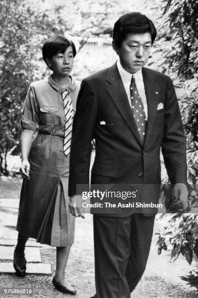 Yoko Sen, daughter of Prince Mikasa, and her husband Masayuki leave to see Emperor Hirohito after vomiting blood on September 21, 1988 in Kyoto,...