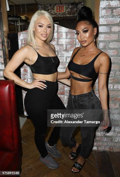 Krissy Turpin and Angie Ang are seen at the grand opening of Wild 'N Out Sports Bar & Arcade on June 15, 2018 in Miami Beach, Florida.