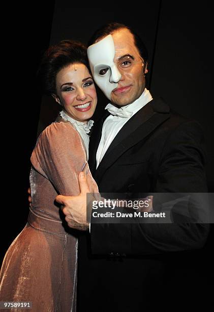 Sierra Boggess and Ramin Karimloo pose backstage following the world premiere of "Love Never Dies" at the Adelphi Theatre on March 9, 2010 in London,...