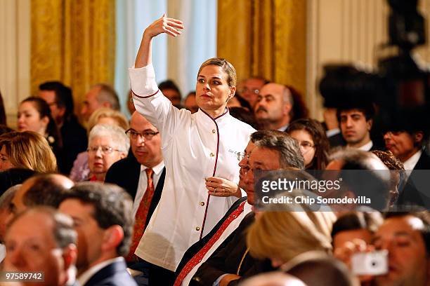Food Network star and chef Cat Cora gestures before an event marking Greek Independence Day in the East Room of the White House March 9, 2010 in...