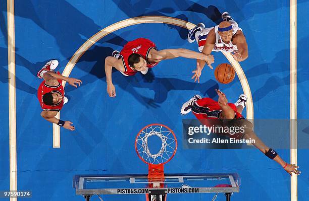 Yi Jianlian and Jarvis Hayes of the New Jersey Nets rebound against Charlie Villanueva of the Detroit Pistons during the game at the Palace of Auburn...