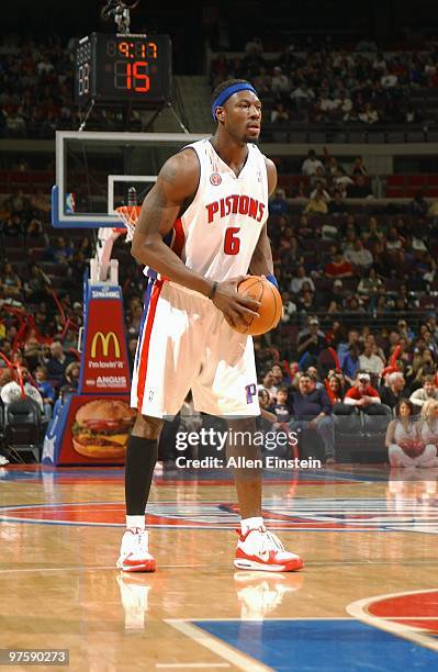 Ben Wallace of the Detroit Pistons looks to move the ball against the New Jersey Nets during the game at the Palace of Auburn Hills on February 6,...