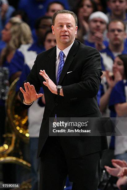Head coach Bobby Gonzalez of the Seton Hall Pirates gestures from the bench against the Providence Friars during the first round game of the Big East...