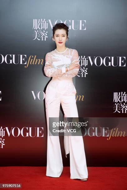 Actress Li Bingbing poses on the red carpet of 2018 Vogue Film Gala on June 15, 2018 in Shanghai, China.